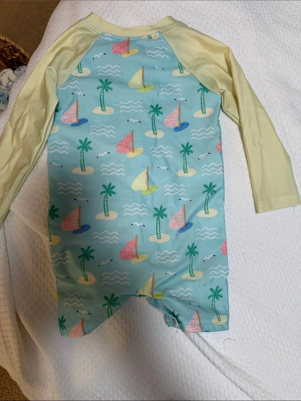 Kids Long-Sleeve One-Piece Swimsuit in Light Blue and Yellow with “J” initial